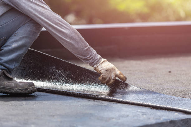 Professional Waterproofing technician working in Brookville, IN